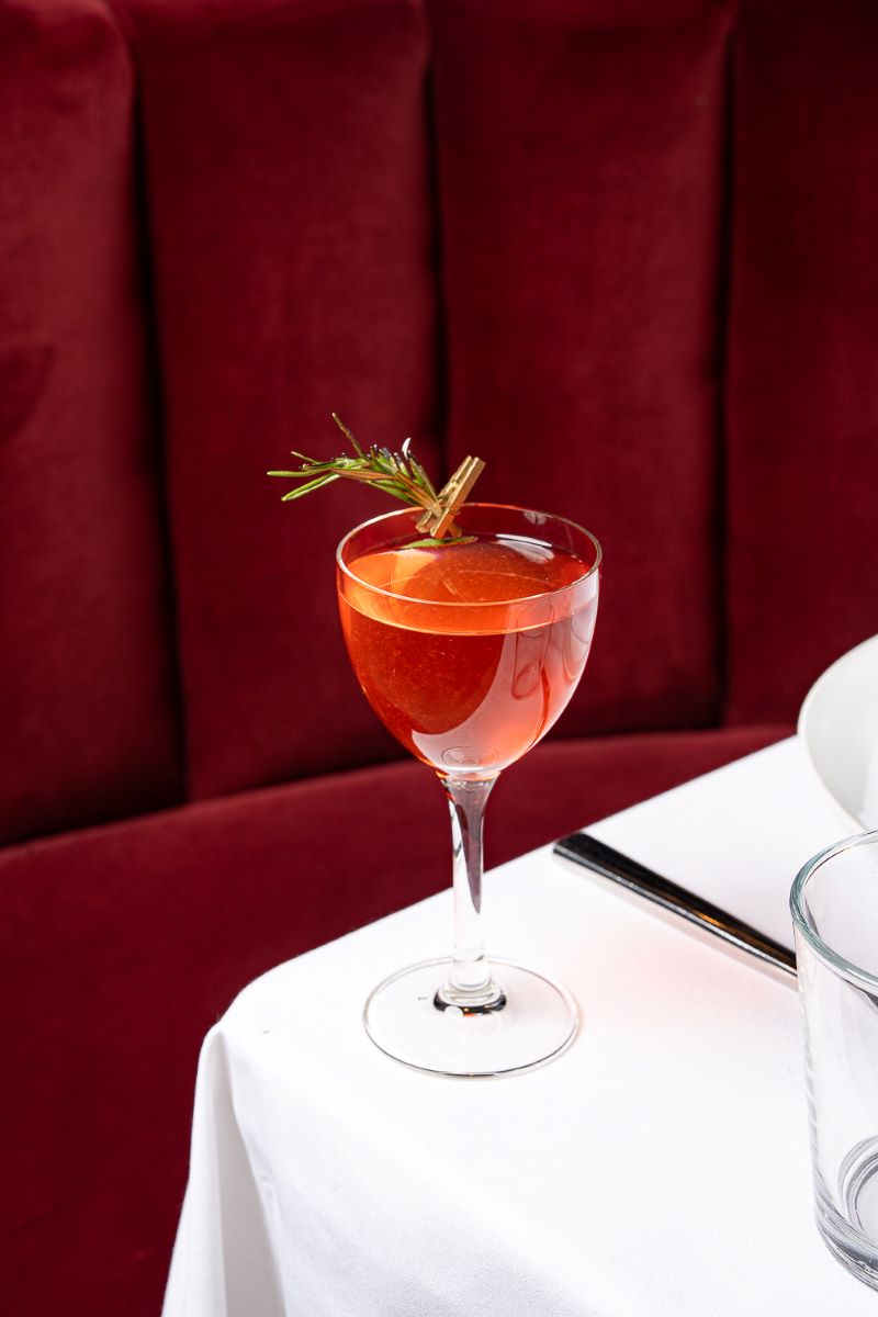Barman Author Coctails, Barman filling the glass with author coctail, ADKT restaurant in LA
